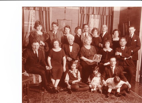 Top from left: Stella Adler; unknown; Lillian Barth Adler Myra (Sara's daughter); Myra's husband? Nan and Albert Adler (Sara's oldest son) Second row, left to right: Paul Adler; Amelia Adler; Jacob P. Adler & his sister Sara Adler (holding a picture of her Francine; Stella (Sara's daughter); I believe the man at the end of the row was actually Sara's husband. But he was so "incidental" that even on his deathbed (this is a sworn-to family story), he was relegated to a cot in the dining room so as not to inconvenience Sara.  Bottom row: Charlotte (Amelia's daughter, and later the "Black Sheep" of the family); Irma (Myra's daughter); and my grandfather Louis, holding his first-born child, Helen 